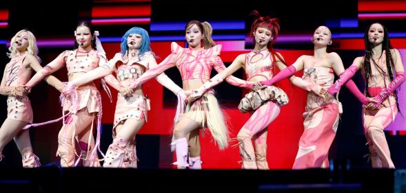 Music group XG performing.