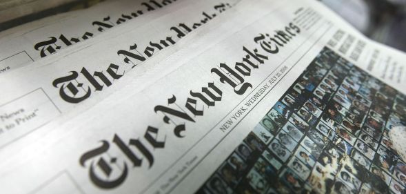 A set of New York Times newspapers.