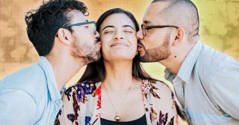 Two people kissing one person.