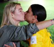 Sam Kerr of Australia celebrates with her partner Kristie Mewis of USA.