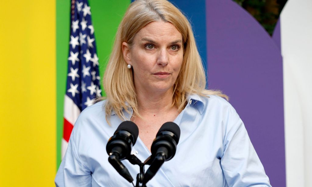 Sarah kate Ellis speaking at an event.