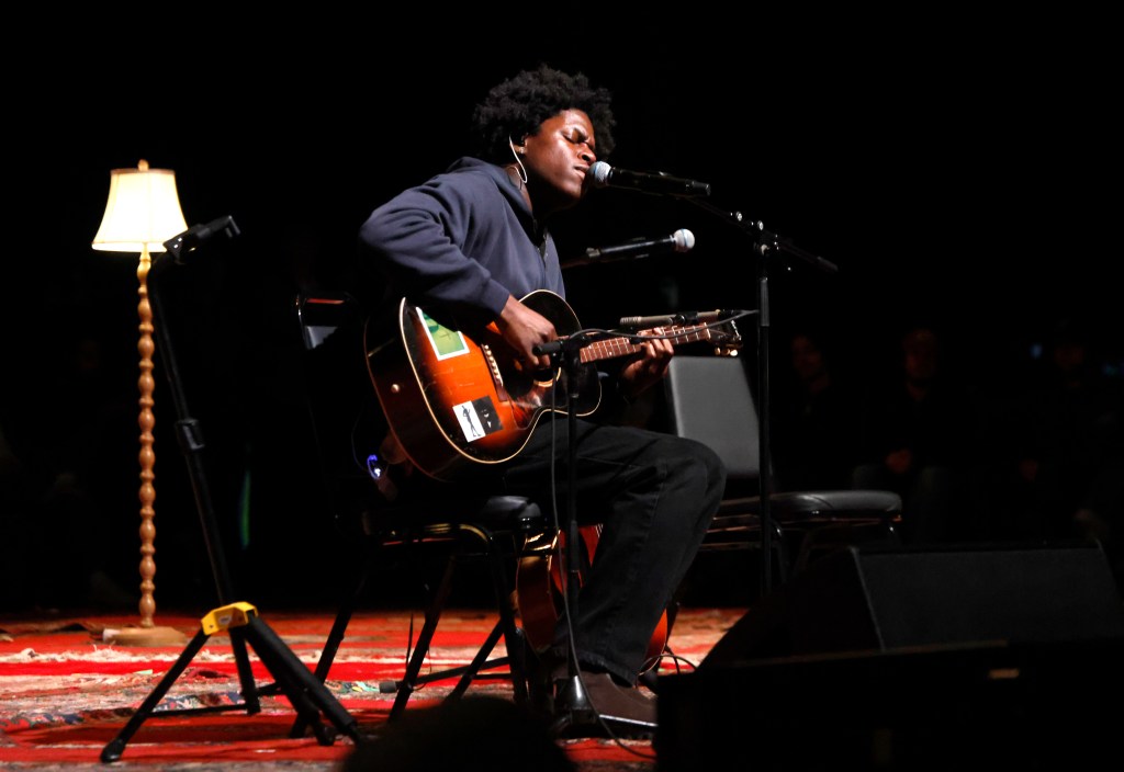 Daniel Caesar performs onstage during Artists For Aid at Shrine Auditorium
