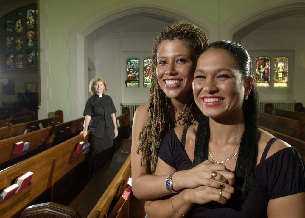 Reverend Cheri DiNovo at Emmanuel Howard Park United Church, performed a same-sex marriage for Paula Barrero (middle) and Blanca Mejias (R)