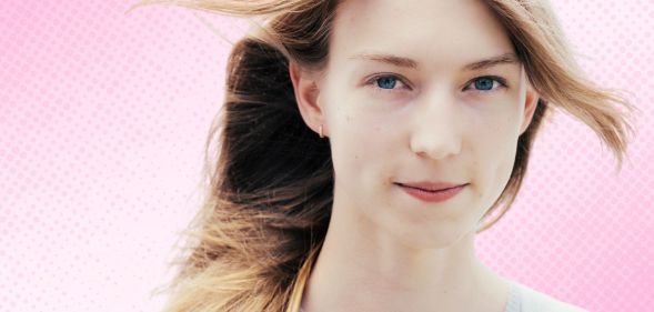 A trans woman superimposed on a pink gradient background.