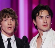 Connor Storrie and Hudson Williams looking shocked