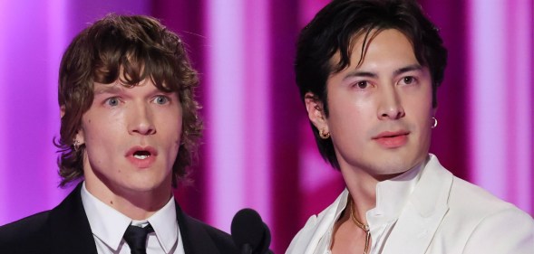 Connor Storrie and Hudson Williams looking shocked