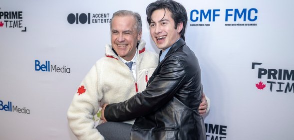 Canadian Prime Minister Mark Carney and Hudson Williams