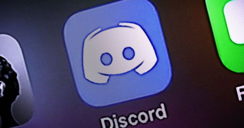 A phone with the Discord app displayed.