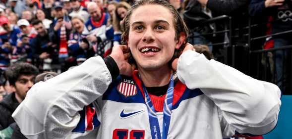 Jack Hughes of United States celebrates the victory during the Ice Hockey Men's Gold Medal Game match between Canada and USA.