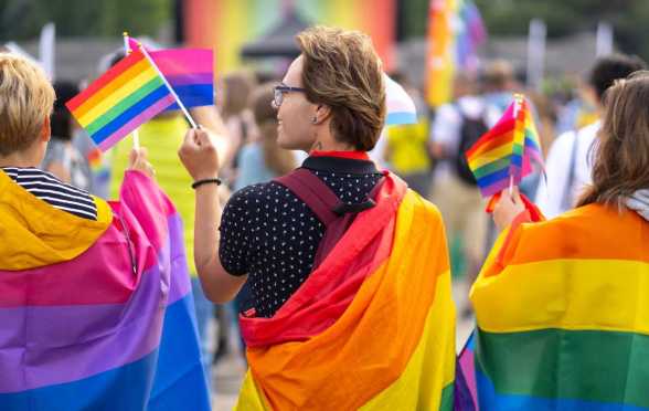 Group of people celebrating the pride month on a pride event