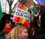 People gather in protest at the Stonewall National Monument after the Trump administration had the National Park Service remove the LGBTQ+ Pride flag from the site.