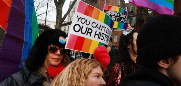 People gather in protest at the Stonewall National Monument after the Trump administration had the National Park Service remove the LGBTQ+ Pride flag from the site.
