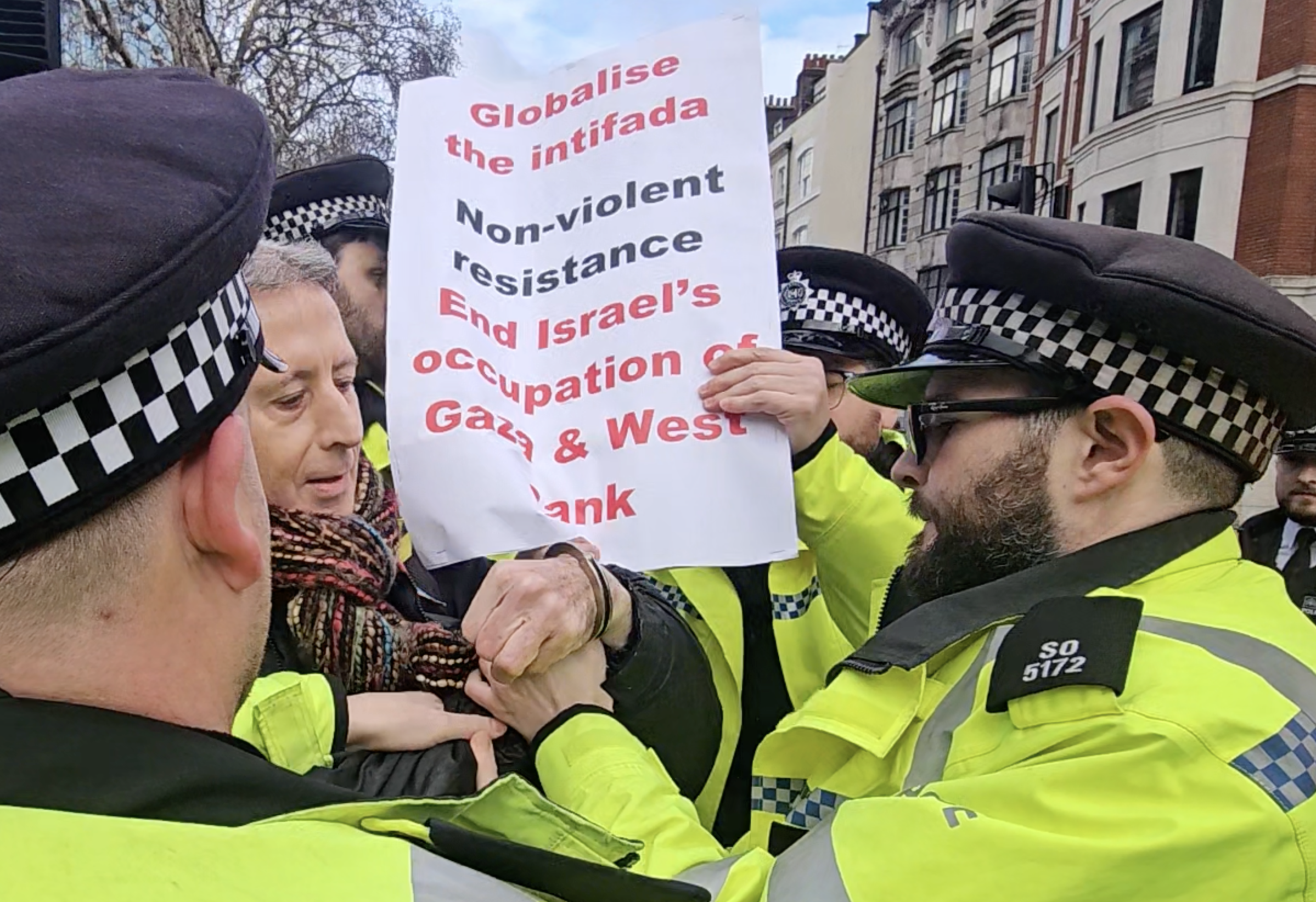 Peter Tatchell arrested for 'globalise the intifada' placard
