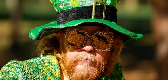A person wearing a St. Patrick's Day outfit.