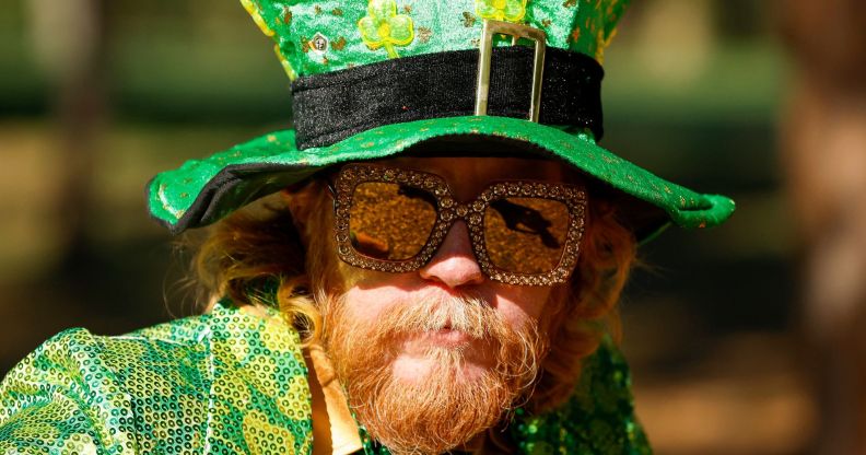 A person wearing a St. Patrick's Day outfit.