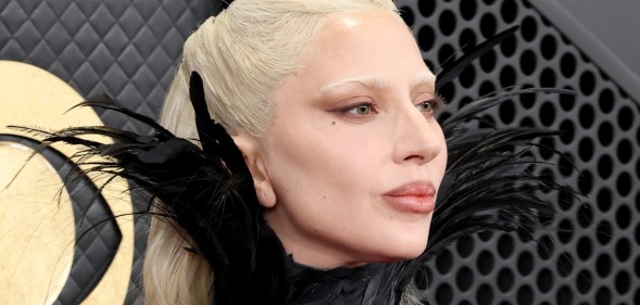 Lady Gaga attends the 68th GRAMMY Awards, wearing a black feathered dress