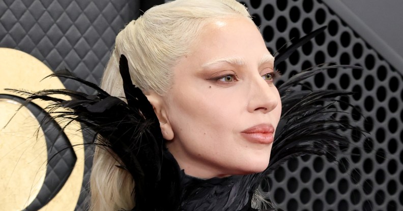 Lady Gaga attends the 68th GRAMMY Awards, wearing a black feathered dress