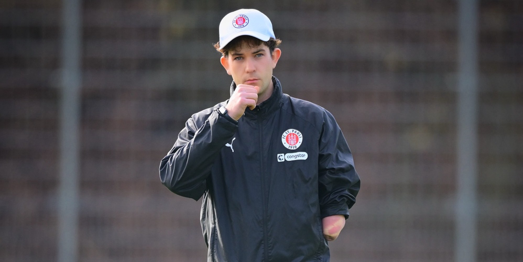 Pro football coach comes out as gay as team sends support