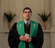 Big Mistakes Dan Levy as pastor Nicky, preaching in a churce