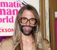 Jonathan Van Ness smiling in sunglasses