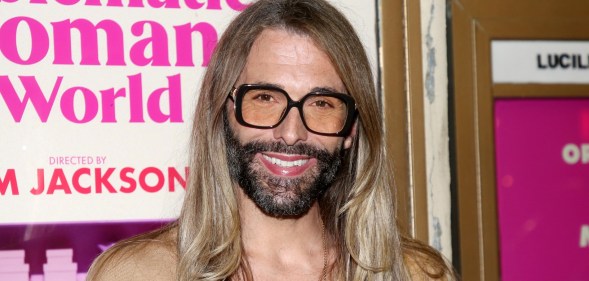Jonathan Van Ness smiling in sunglasses