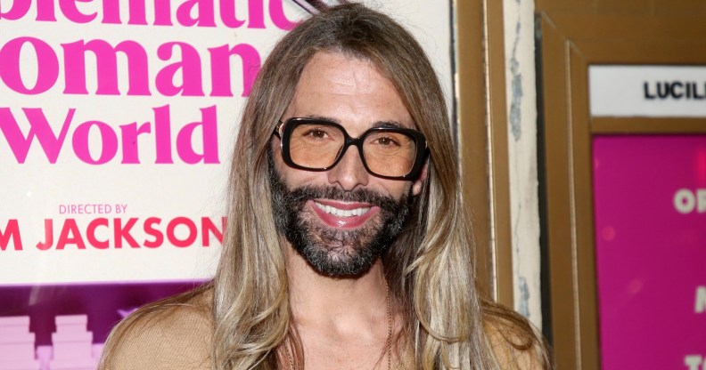 Jonathan Van Ness smiling in sunglasses