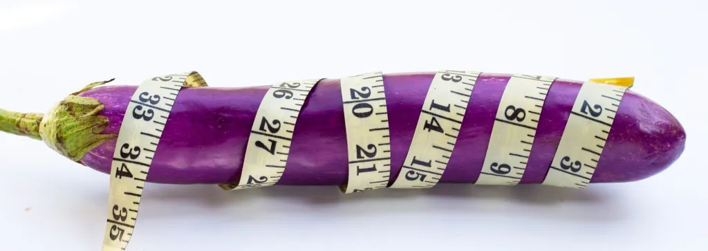 long aubergine wrapped in measuring tape