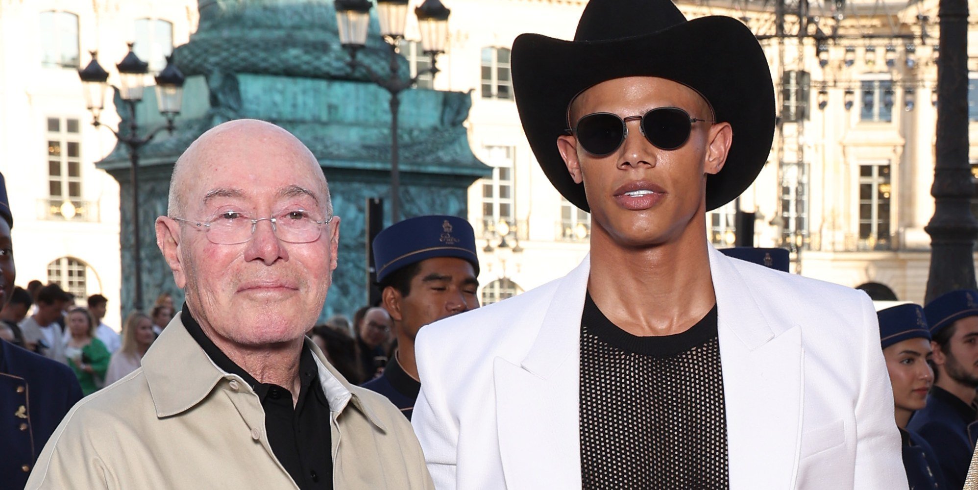 Billionaire producer reaches divorce settlement with model ex-husband