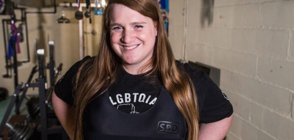 JayCee Cooper in a weight-lifting room