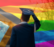 Student graduating in front of a pride flag