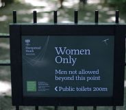 The sign indicating the 'Women Only' swimming pool is seen attached to gates on Hampstead Heath in central London