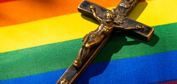 cross on a pride flag