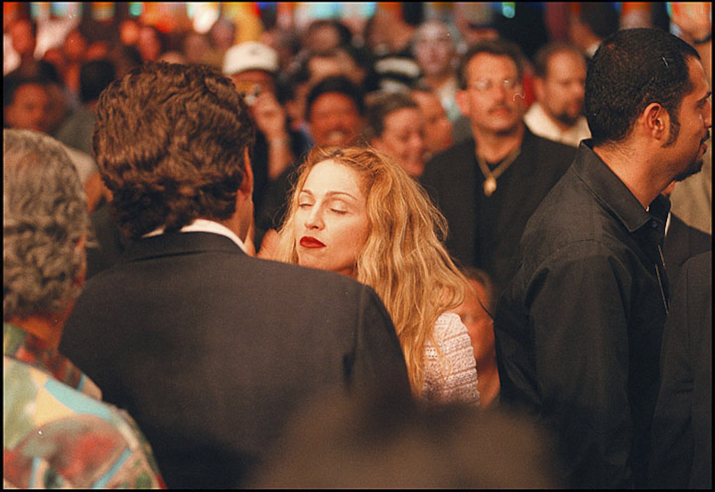 John F Kennedy Jr and Madonna talk together at the MGM Grand Garden Arena, Paradise, Nevada, June 28, 1997