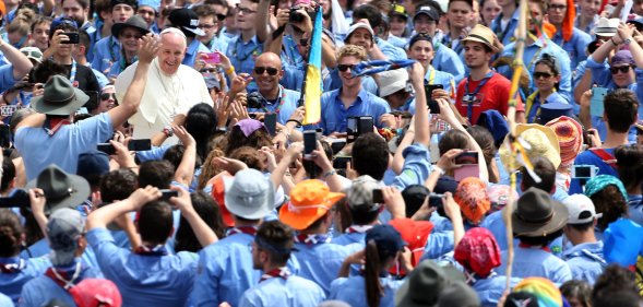 The late Pope Francis meets with members of the Association of Italian Catholic Guides and Scouts (AGESCI) in 2015