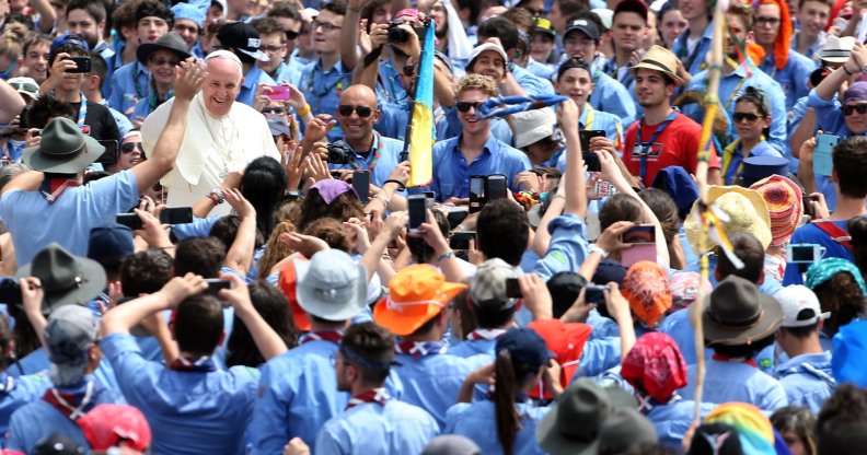 The late Pope Francis meets with members of the Association of Italian Catholic Guides and Scouts (AGESCI) in 2015
