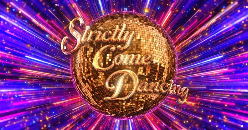 colourful explosion behind the Strictly Come Dancing golden glitter ball