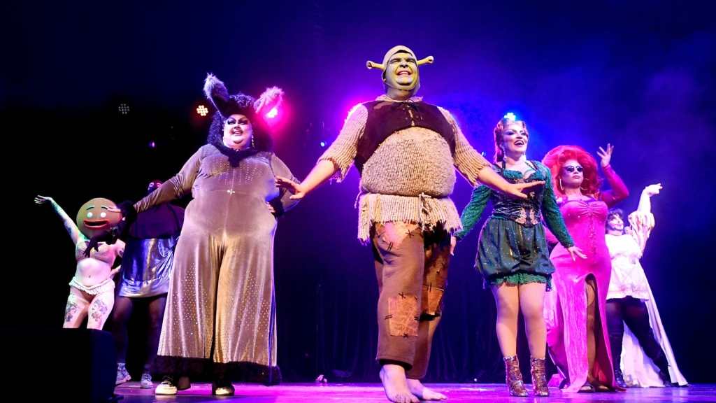 Swamplesque: performers on stage dressed as Shrek characters.