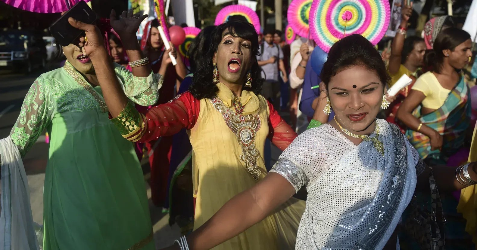 Bangladeshi hijras dance in the street during a rally. (Munir Uz Zaman/Getty)