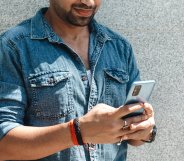 indian man using phone