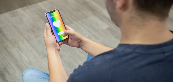 man using gay dating app