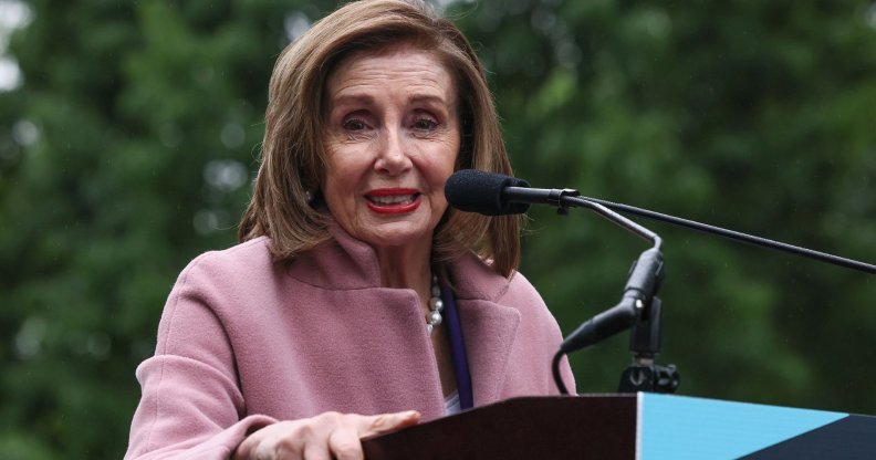 Representative Nancy Pelosi speaks at a podium