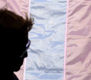 person with trans flag