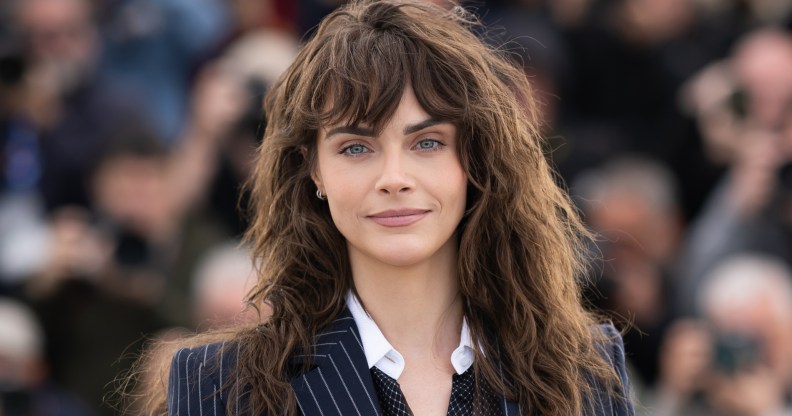 Cara Delevingne poses during Cannes photocall