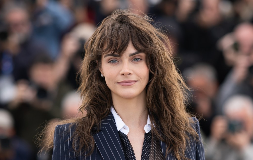 Cara Delevingne poses during Cannes photocall