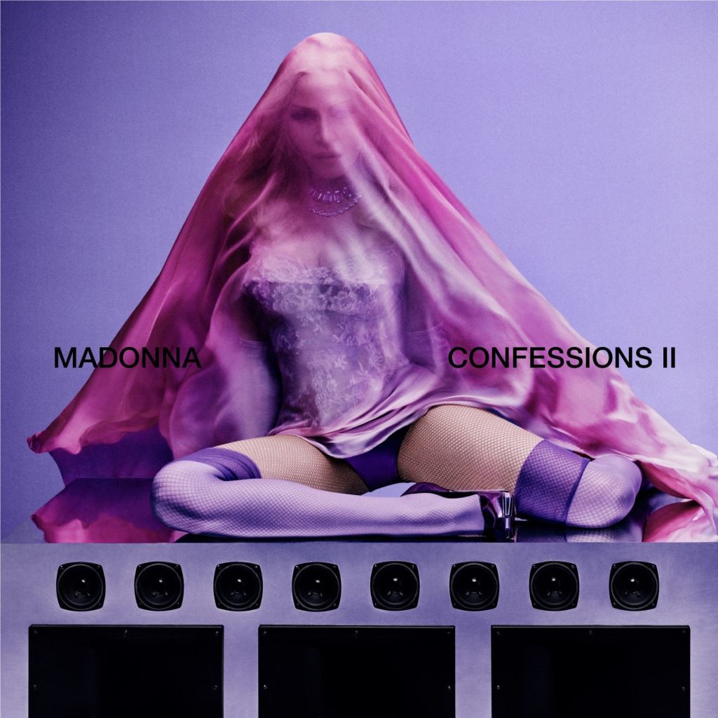 Madonna's Confessions II is out now. Album art of Madonna sat on top of a speaker in purple tights and corset covered in a transparent pink silk scarf