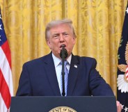 U.S. President Donald Trump addresses the nation from the East Room of the White House