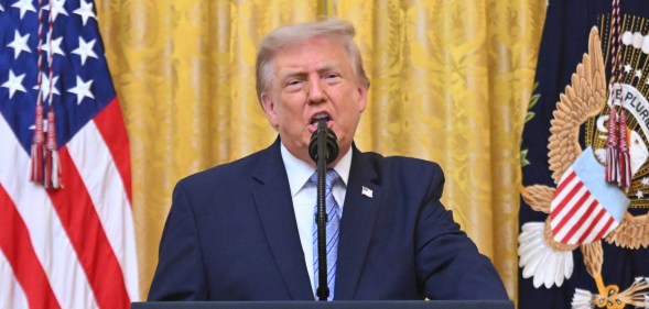 U.S. President Donald Trump addresses the nation from the East Room of the White House