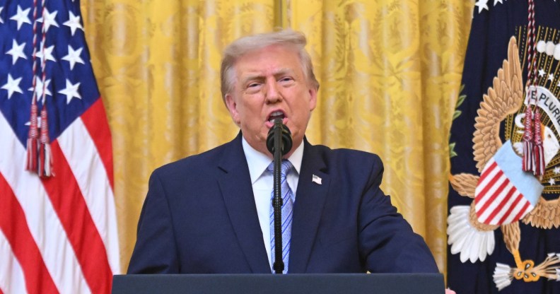U.S. President Donald Trump addresses the nation from the East Room of the White House