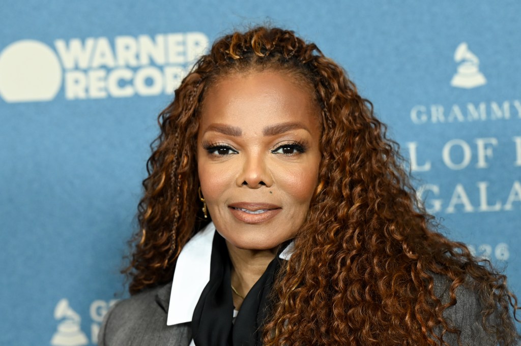 Janet Jackson in a grey suit