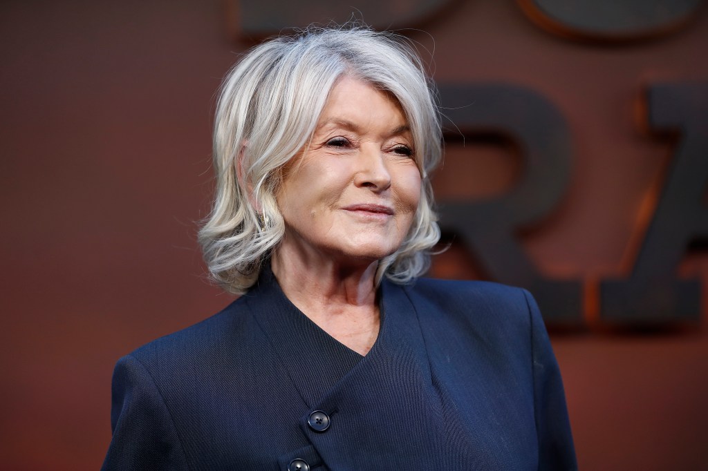 Martha Stewart in a dark navy suit